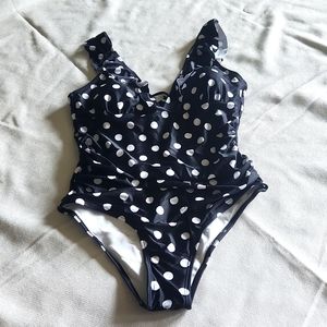 Black and white polka dot one piece bathing suit